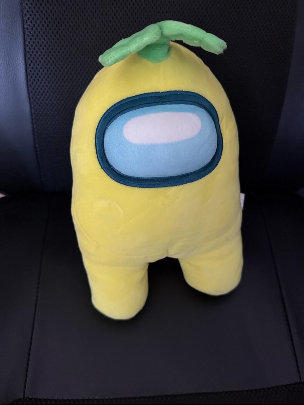 Yellow Plush Among Us Character Plush with Green Leaf Accent